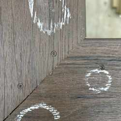 Outback Deck - Damaged composite railing and missing screw.