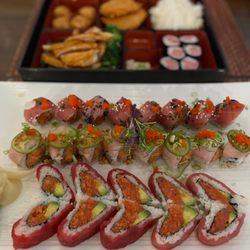Xaga - From back to front - chicken teriyaki bento, Sunset Roll Special, Mystic Roll Special, Lover Roll Special