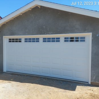 Melchor's Garage Door - (Ordered by the super) 15'8" x 7' white, short reg. Panels with long windows (stockton design) - Garage Door Services Near Me - Rialto, California Melchor's Garage Door - (Ordered by the super) 15'8" x 7' white, short reg. Panels with long windows (stockton design) - Garage Door Services Near Me - Rialto, California