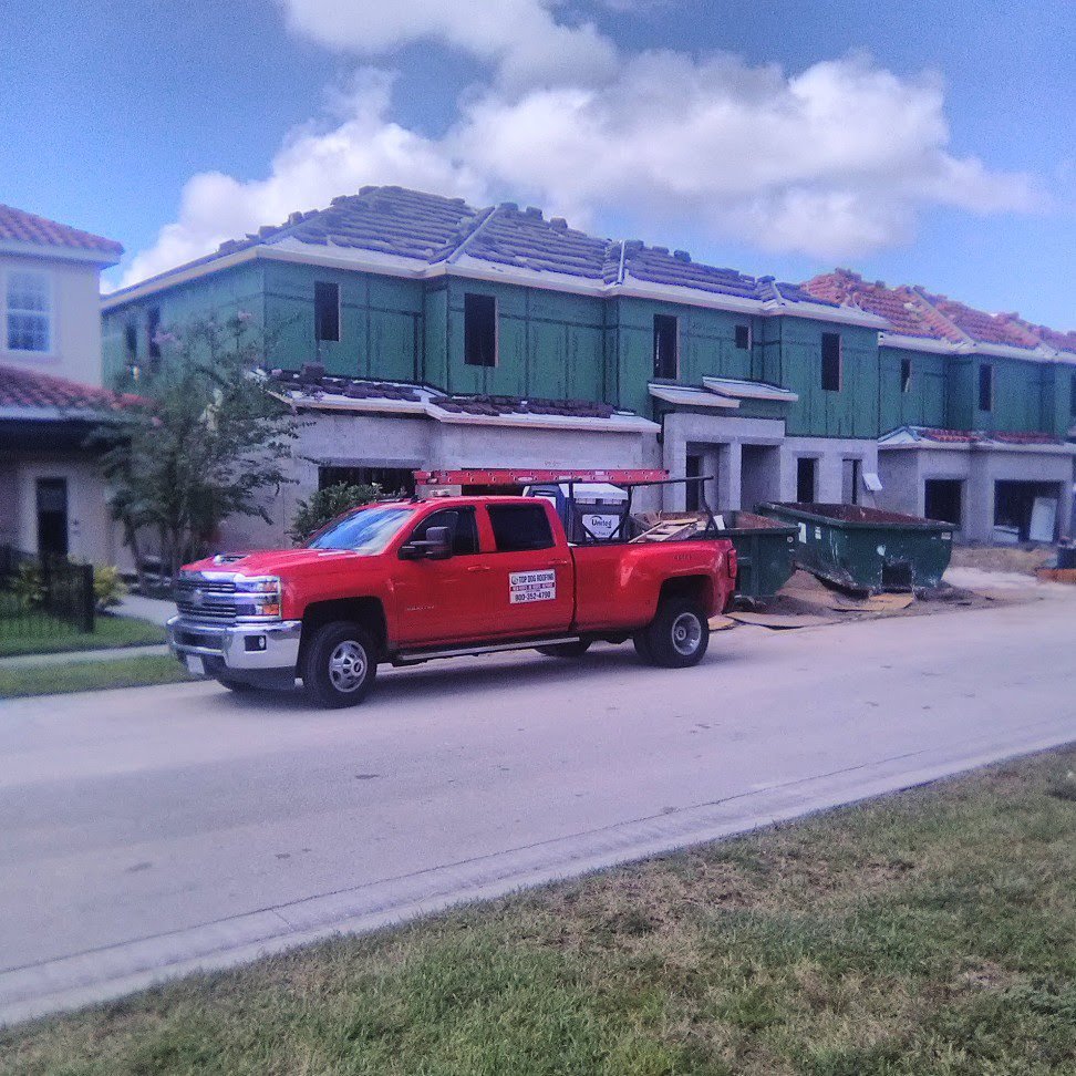 Slide of Top Dog Roofing
