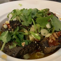 "Stinky Tofu" crispy fried fermented tofu in dipping sauce.