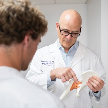 David S. Gazzaniga, MD - Dr. David Gazzaniga with Anatomical Hip Model - Orthopedists Near Me - Newport Beach, California David S. Gazzaniga, MD - Dr. David Gazzaniga with Anatomical Hip Model - Orthopedists Near Me - Newport Beach, California