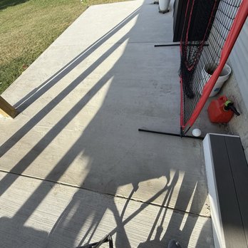 Pluto Remodeling - Color mismatch after trying to fix where it rained. Will not come back to match the concrete color or even answer. - Flooring Near Me