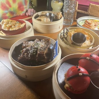 Wusong Road - Sticky ribs, chicken baos, corn rangoons, pan fried dumplings, pork roll ups - Tiki Bars Near Me - Cambridge, Massachusetts Wusong Road - Sticky ribs, chicken baos, corn rangoons, pan fried dumplings, pork roll ups - Tiki Bars Near Me - Cambridge, Massachusetts