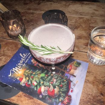 The Snug  - Delicious christmapolitan drink. Alas, if I had only ordered a second one of these, the whole debacle may have been avoided.... - Bars Near Me - Sacramento, California