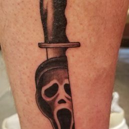 Ghost Face with Signature Blade from Scream Horror Movie Series