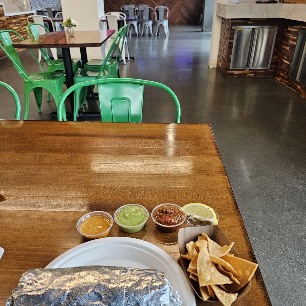 Araujo's Mexican Grill - My super burrito with salsa lime and chips - Tacos Near Me - San Jose, California Araujo's Mexican Grill - My super burrito with salsa lime and chips - Tacos Near Me - San Jose, California
