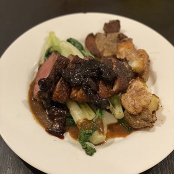 Wok Theology - a plate of food on a table - Personal Chefs Near Me Wok Theology - a plate of food on a table - Personal Chefs Near Me