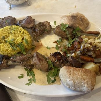 Oasis Restaurant & Catering - Lamb Kabob, veggies , rice. it was ok.except the lamb was mostly fat or chewy. Wanted  the chicken,my wife ordered this 4 me - Moroccan Near Me - Pismo Beach, California