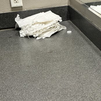 LA Fitness - Piles of paper towels, I guess the guy run out of towels to mark his machines - Gyms Near Me - Silver Spring, Maryland