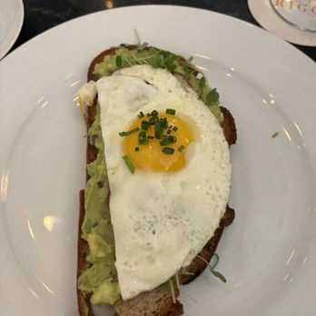 Café Riggs - Avocado toast with an egg over easy - Breakfast & Brunch Near Me - Washington, DC, District of Columbia Café Riggs - Avocado toast with an egg over easy - Breakfast & Brunch Near Me - Washington, DC, District of Columbia
