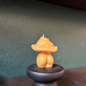 The ABQ Collective - a yellow candle on a black candle holder - Hair Salons Near Me - Albuquerque, New Mexico The ABQ Collective - a yellow candle on a black candle holder - Hair Salons Near Me - Albuquerque, New Mexico