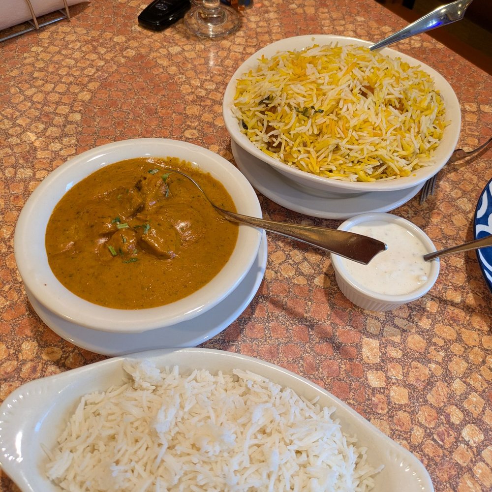 Biryani Joint - Chicken 65 Biryani (top), Butter Chicken (middle) with jasmine rice (bottom) - Indian Near Me - Burtonsville, Maryland Biryani Joint - Chicken 65 Biryani (top), Butter Chicken (middle) with jasmine rice (bottom) - Indian Near Me - Burtonsville, Maryland