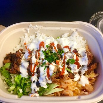 TaKorean - bowl with white rice, half kimchi & half romaine slaw, chicken, lime cream, hot sauce and cilantro - Asian Fusion Near Me - Washington, DC, District of Columbia TaKorean - bowl with white rice, half kimchi & half romaine slaw, chicken, lime cream, hot sauce and cilantro - Asian Fusion Near Me - Washington, DC, District of Columbia
