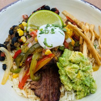 Lakeview Cantina - Beef Fajita Rice Bowl with braised beef, peppers and onions, black beans, cilantro lime rice, roasted corn pico, sour cream, and guacamole - Mexican Near Me - Wheeling, West Virginia
