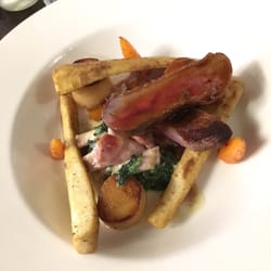 The Old Bell Inn - Roast duck breast with fondant potatoes, glazed carrots & parsnips, and creamed bacon spinach
