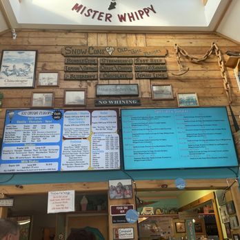 Mister Whippy - Their menu hung up high beneath skylights - Ice Cream & Frozen Yogurt Near Me - Chincoteague Island, Virginia Mister Whippy - Their menu hung up high beneath skylights - Ice Cream & Frozen Yogurt Near Me - Chincoteague Island, Virginia