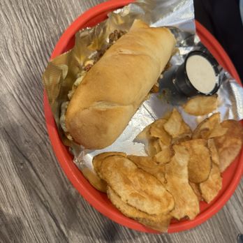 The Backwoods Bar And Grill - Ribeye Philly with in-house made potato chips - American Near Me - Sissonville, West Virginia The Backwoods Bar And Grill - Ribeye Philly with in-house made potato chips - American Near Me - Sissonville, West Virginia