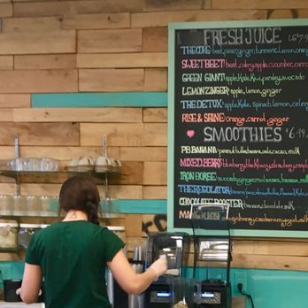 Whole Heart Cafe - a woman working behind the counter - Cafes Near Me - Cortland, New York