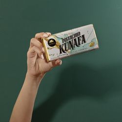 Omniya Delicacy - Dubai Bar Pistachio: A rich, crunchy pistachio-filled bar coated in smooth chocolate - a perfect blend of flavor and luxury in every bite!
