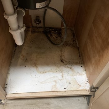 Updown Cleaning Services - Cabinet before underneath sink in kitchen. - Home Cleaning Near Me Updown Cleaning Services - Cabinet before underneath sink in kitchen. - Home Cleaning Near Me