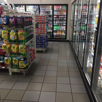 7-Eleven - a grocery store aisle with sodas, sodas, and other beverages - Gas Stations Near Me - Naples, Florida