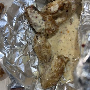 Fire On The Mountain - Garlic Parm sauce on itty bitty wings - Chicken Wings Near Me - Denver, Colorado