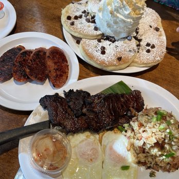 Eggs 'n Things Ko Olina - Kalbi n eggs with jalapeño bacon fried rice Chocolate Chip Pancakes w/ macadamia nuts Side of Portuguese Sausage - American Near Me - Kapolei, Hawaii