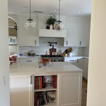 Hollywood Refinishing - a kitchen with white cabinets - General Contractors Near Me - North Hollywood, California