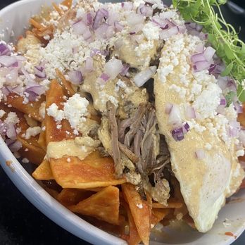Heirloom Kitchen - Chilaquiles with braised pork shoulder. Yum! - Burgers Near Me - Stockton, California Heirloom Kitchen - Chilaquiles with braised pork shoulder. Yum! - Burgers Near Me - Stockton, California