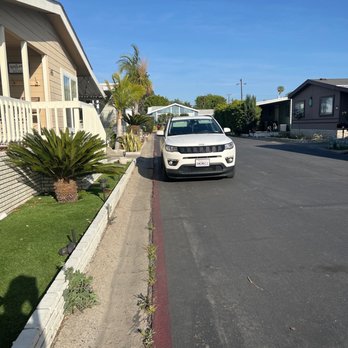 Dedicated Transportation Services - Here's a car clearly parked in the red, and yet the tow company would not come! - Towing Near Me - Garden Grove, California