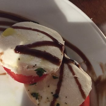 Valentino's American Restaurant - Caprese salad... what was left. It started much larger! - American Near Me - Montevideo, Minnesota