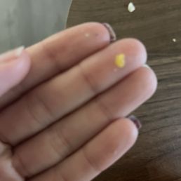Weird hard piece of mystery item in my salad.