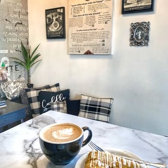 Vault Coffee - Charlie Brown latte and pumpkin scone - Coffee & Tea Near Me - Coeur d'Alene, Idaho Vault Coffee - Charlie Brown latte and pumpkin scone - Coffee & Tea Near Me - Coeur d'Alene, Idaho