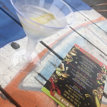 Gordos - a drink and a menu on a table - Tacos Near Me - Patchogue, New York