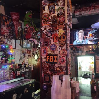 Fat Tuesday's - a bar with a lot of stickers on the wall - Sports Bars Near Me - Warrenton, Virginia Fat Tuesday's - a bar with a lot of stickers on the wall - Sports Bars Near Me - Warrenton, Virginia