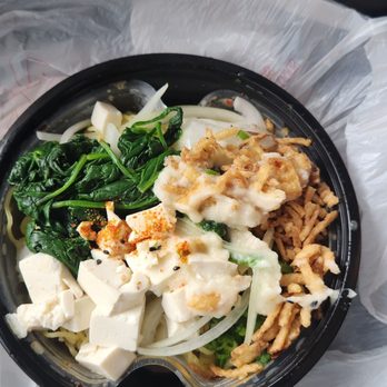 Kami Ramen Bar - Lid off, toppings are separated from the broth. - Ramen Near Me - Memphis, Tennessee