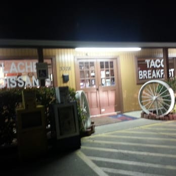Happy Donuts - the front of a restaurant at night - Donuts Near Me - Nederland, Texas Happy Donuts - the front of a restaurant at night - Donuts Near Me - Nederland, Texas