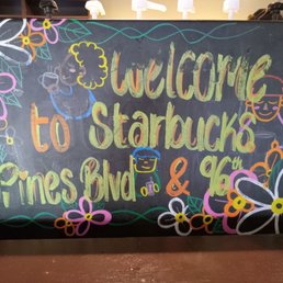a chalk board with a welcome sign a chalk board with a welcome sign
