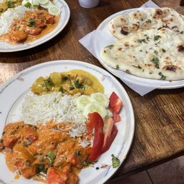 two plates of food on a table two plates of food on a table