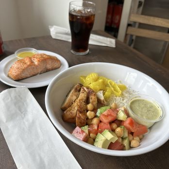 Elia Cafe & Mediterranean Products - Chicken Breast Rice Bowl with side of salmon - Mediterranean Near Me - Miami, Florida Elia Cafe & Mediterranean Products - Chicken Breast Rice Bowl with side of salmon - Mediterranean Near Me - Miami, Florida