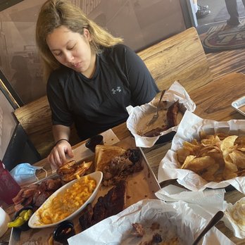 Gettin' Basted - My wife enjoying the "Judges plate" - Barbeque Near Me - Branson, Missouri Gettin' Basted - My wife enjoying the "Judges plate" - Barbeque Near Me - Branson, Missouri
