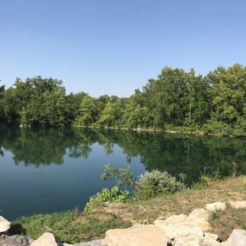 The Quarry - a lake surrounded by trees - Wine Bars Near Me - Wentzville, Missouri The Quarry - a lake surrounded by trees - Wine Bars Near Me - Wentzville, Missouri