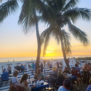 Junkanoo Below Deck - Junkanoo Beach sunset dining deck - American Near Me - Fort Myers Beach, Florida Junkanoo Below Deck - Junkanoo Beach sunset dining deck - American Near Me - Fort Myers Beach, Florida