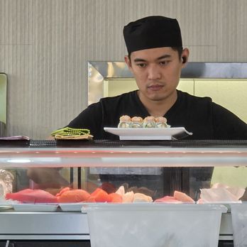 Sakura IX - One of the Sushi Chefs admiring his Culinary Masterpiece. - Japanese Near Me - Roanoke, Virginia