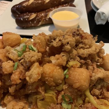 SpeakEasy Bar & Grill - Calamari with banana peppers and fried pineapples; soft baked pretzels - New American Near Me - Newport, Rhode Island SpeakEasy Bar & Grill - Calamari with banana peppers and fried pineapples; soft baked pretzels - New American Near Me - Newport, Rhode Island