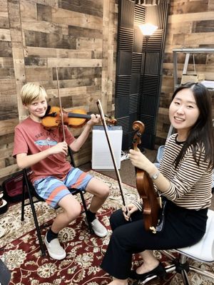 Why Choose Roos Studios? - All Our Teachers Are Well-Qualified, Motivated, and FBI Background Checked.
Great music teachers are hard to come by. They need a blend of extreme talent, personality, and a child-safe background. We have taken careful steps to only hire those that meet all requirements.
All Lessons are Captured on HD Security Cameras.
With Hi-Def cameras in every room, your child’s safety is assured. Students are afforded the freedom of autonomy while parents can rest easy knowing that they can observe the lesson at any time from the monitors in our waiting rooms.
State Of The Art Scheduling.
Our scheduling is designed with you in mind! We meticulously schedule around school breaks and major holidays to give you a low-stress experience. Easily reschedule days you know you’ll be unable to make it (up to 24 hours before your lesson), and same day sick cancellations are given free makeup lessons. All lessons are month to month, so you never have to be worried about being locked into a contract. Why Choose Roos Studios? - All Our Teachers Are Well-Qualified, Motivated, and FBI Background Checked.
Great music teachers are hard to come by. They need a blend of extreme talent, personality, and a child-safe background. We have taken careful steps to only hire those that meet all requirements.
All Lessons are Captured on HD Security Cameras.
With Hi-Def cameras in every room, your child’s safety is assured. Students are afforded the freedom of autonomy while parents can rest easy knowing that they can observe the lesson at any time from the monitors in our waiting rooms.
State Of The Art Scheduling.
Our scheduling is designed with you in mind! We meticulously schedule around school breaks and major holidays to give you a low-stress experience. Easily reschedule days you know you’ll be unable to make it (up to 24 hours before your lesson), and same day sick cancellations are given free makeup lessons. All lessons are month to month, so you never have to be worried about being locked into a contract.