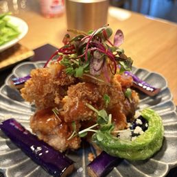 Karaage (Fried Chicken) Japanese fried chicken, eggplant, grated daikon, sprouts, & og kurozu vinaigrette. Karaage (Fried Chicken) Japanese fried chicken, eggplant, grated daikon, sprouts, & og kurozu vinaigrette.