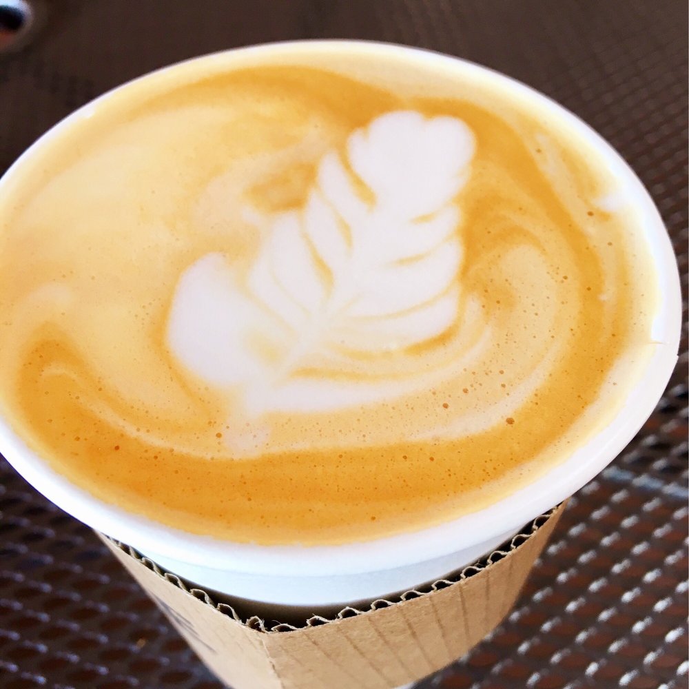 Coffeeville - A non-fat regular latte. So good! Wonderful expresso! The design didn't stay because there wasn't enough fat in it.  Lol - Coffee & Tea Near Me - Watsonville, California