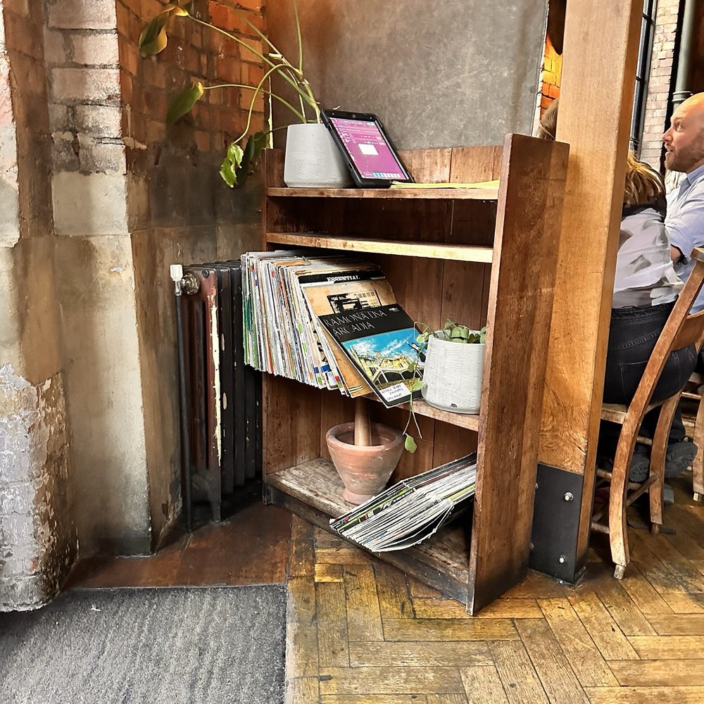 Smoking Goat - Book shelf, notice the khôk & sak on the bottom shelf - Thai Near Me - London, XGL Smoking Goat - Book shelf, notice the khôk & sak on the bottom shelf - Thai Near Me - London, XGL